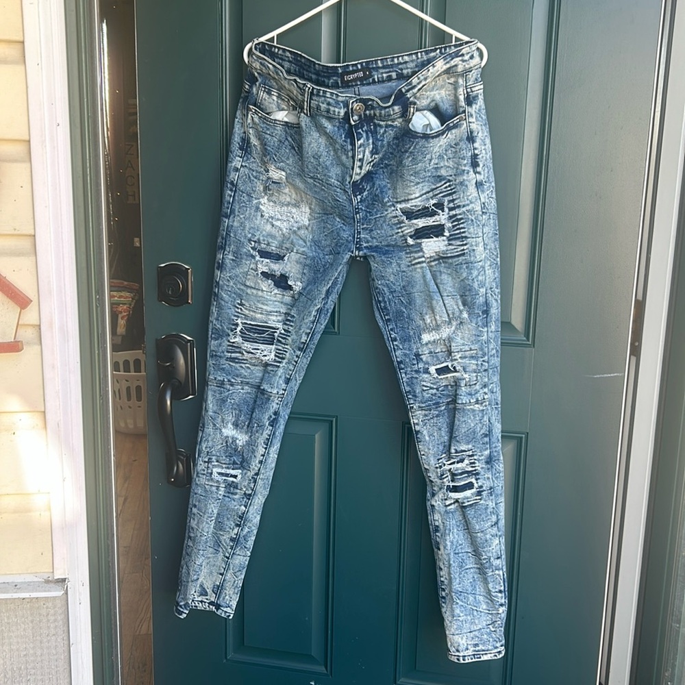 Stretchy distressed with holes size 36 waist brand is encrypted